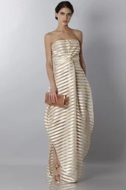 Abito bustier oro con trasparenze
