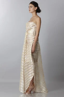 Abito bustier oro con trasparenze