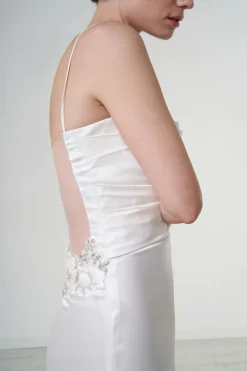 Abito con corpetto bustier e decoro posteriore