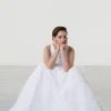 Abito con decori in pizzo plumetis