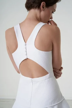Abito con decori in pizzo plumetis