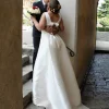 Abito con pizzo e fiocco