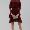 Abito corto burgundy con balze e maniche a mantella