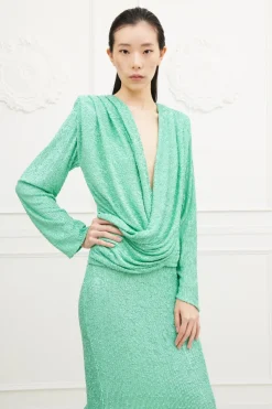 Abito lungo in paillettes