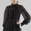 Blusa microplumetis