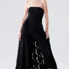 Jumpsuit bustier con gonna sovrapposta
