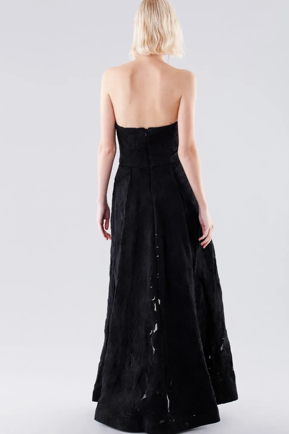 Jumpsuit bustier con gonna sovrapposta