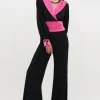 Jumpsuit con dettagli fucsia