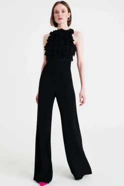Jumpsuit nera in crepes con rouches