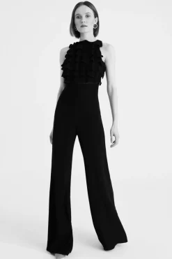 Jumpsuit nera in crepes con rouches