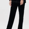 Pantaloni in denim flock