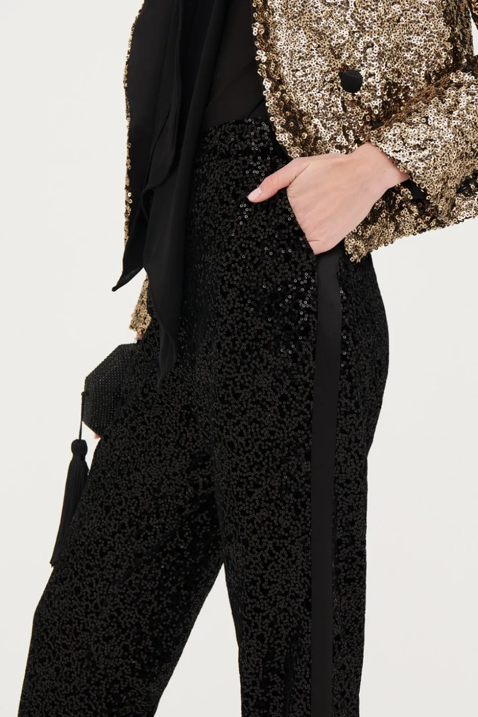Pantaloni in velluto e paillettes
