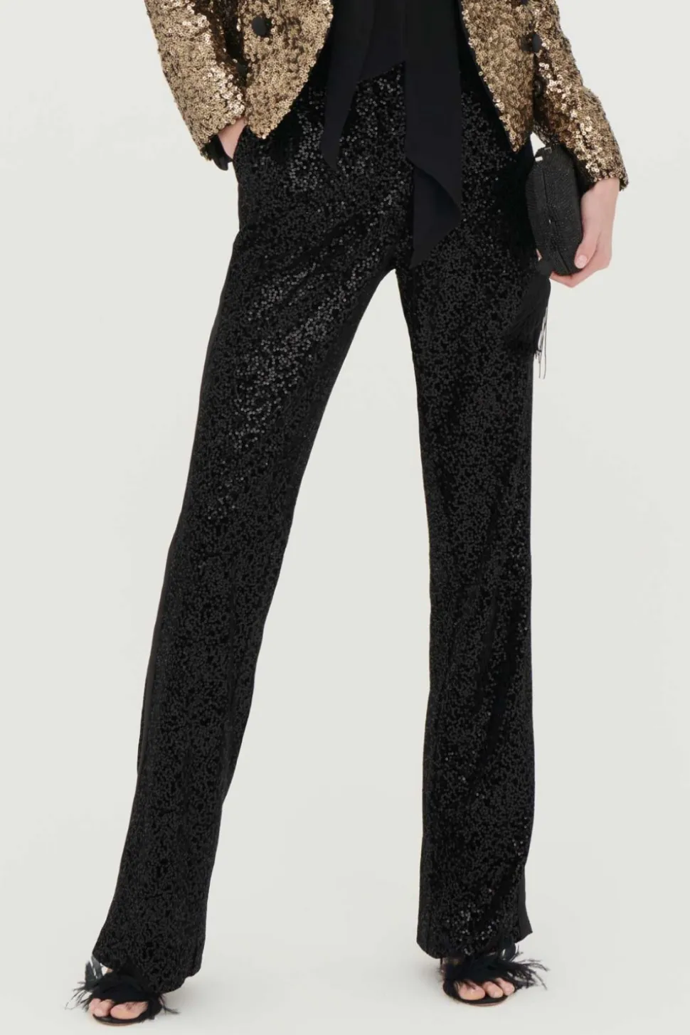 Pantaloni in velluto e paillettes