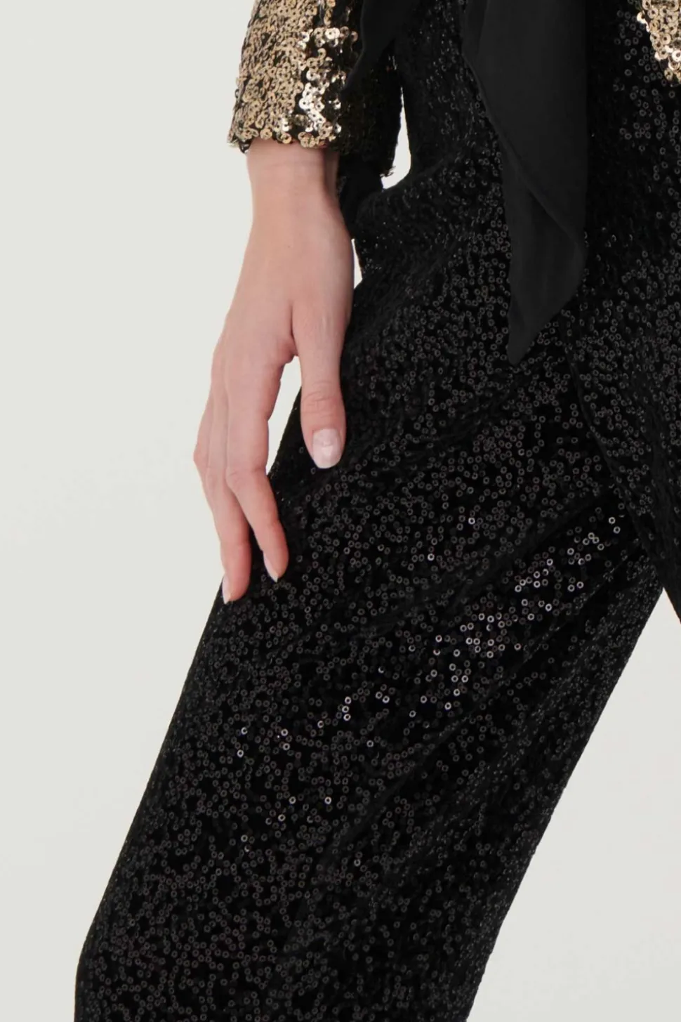 Pantaloni in velluto e paillettes