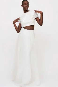 Top paillettes e gonna bianca