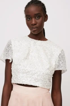 Top paillettes e gonna rosa