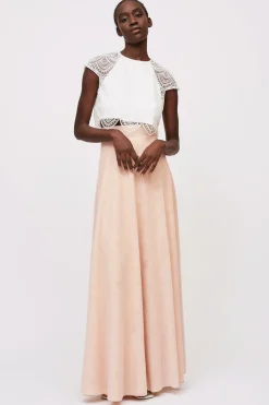 Top pizzo e gonna rosa