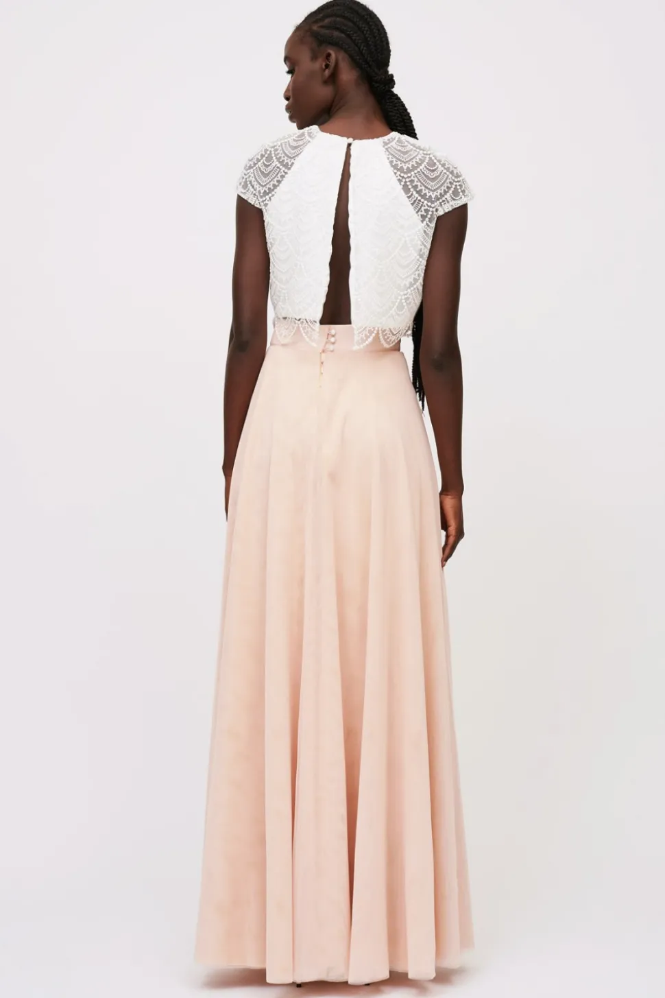 Top pizzo e gonna rosa